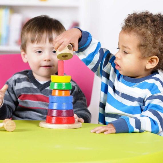 2-toddlers-with-block-toy-cropped2